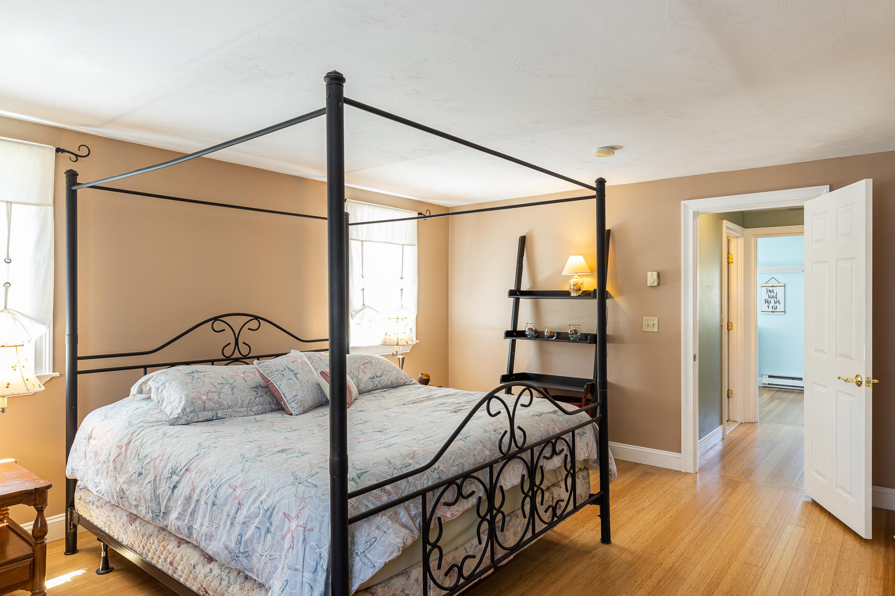 29 Hitching Post Lane Centerville, MA 02632 - Photo 15 of 29 a bedroom with a bed and a table