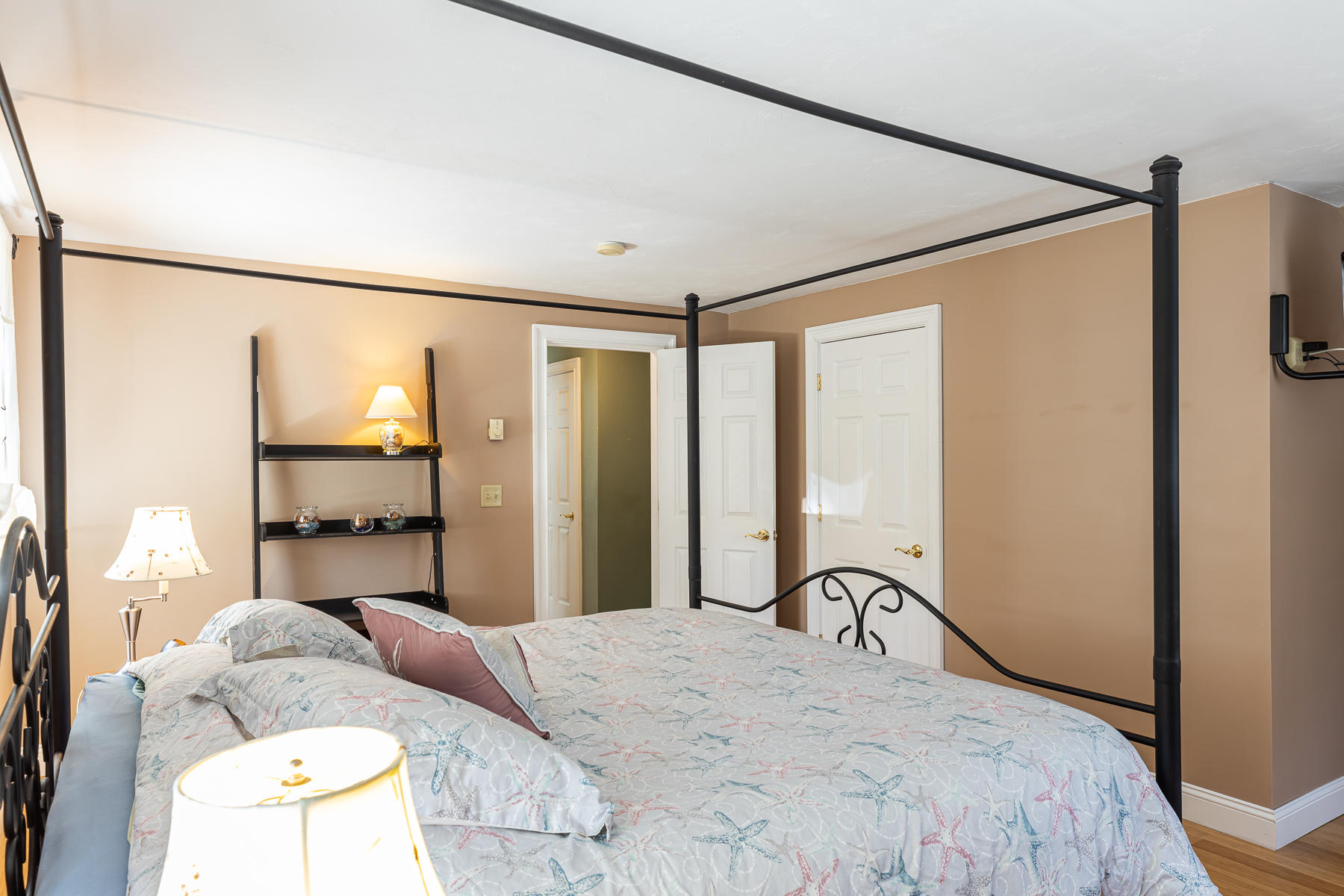 29 Hitching Post Lane Centerville, MA 02632 - Photo 16 of 29 a bedroom with a bed and a large mirror with a flat tv screen