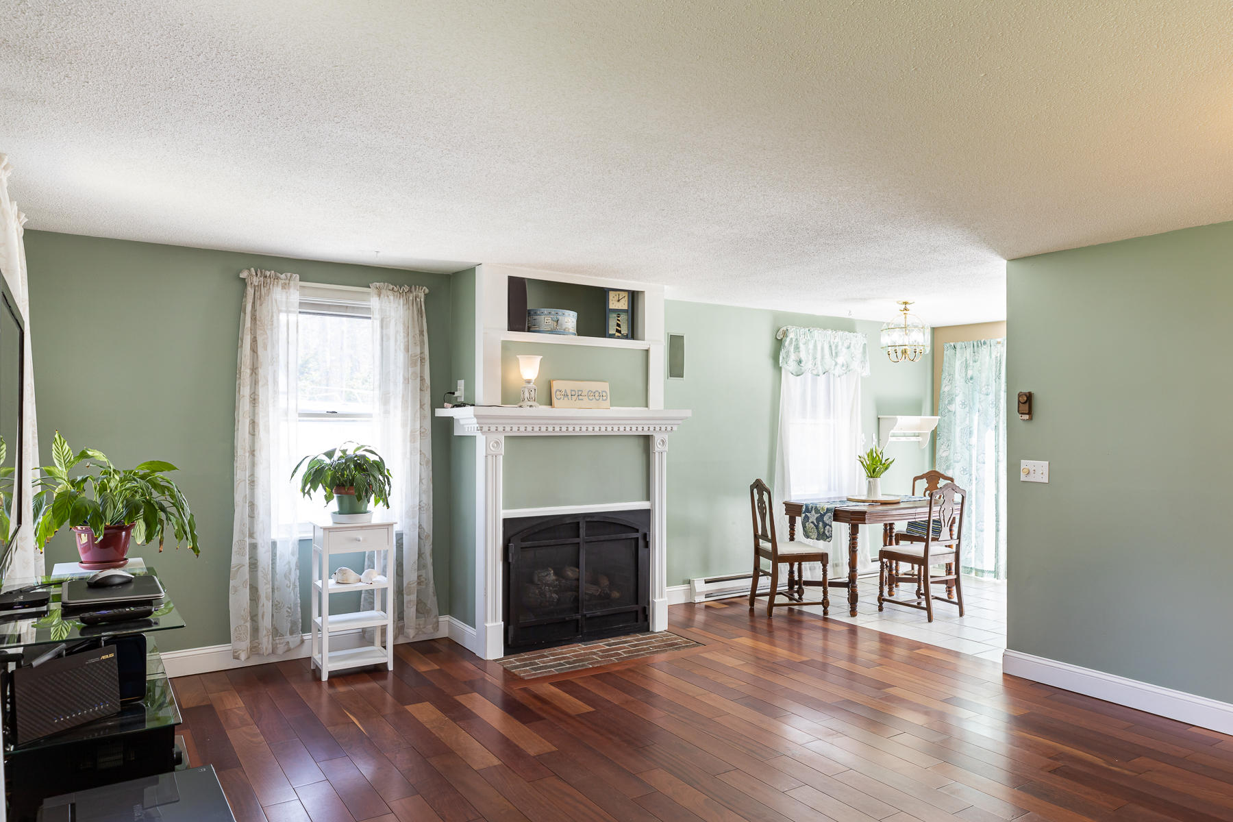 29 Hitching Post Lane Centerville, MA 02632 - Photo 2 of 29 a living room with furniture and a fireplace