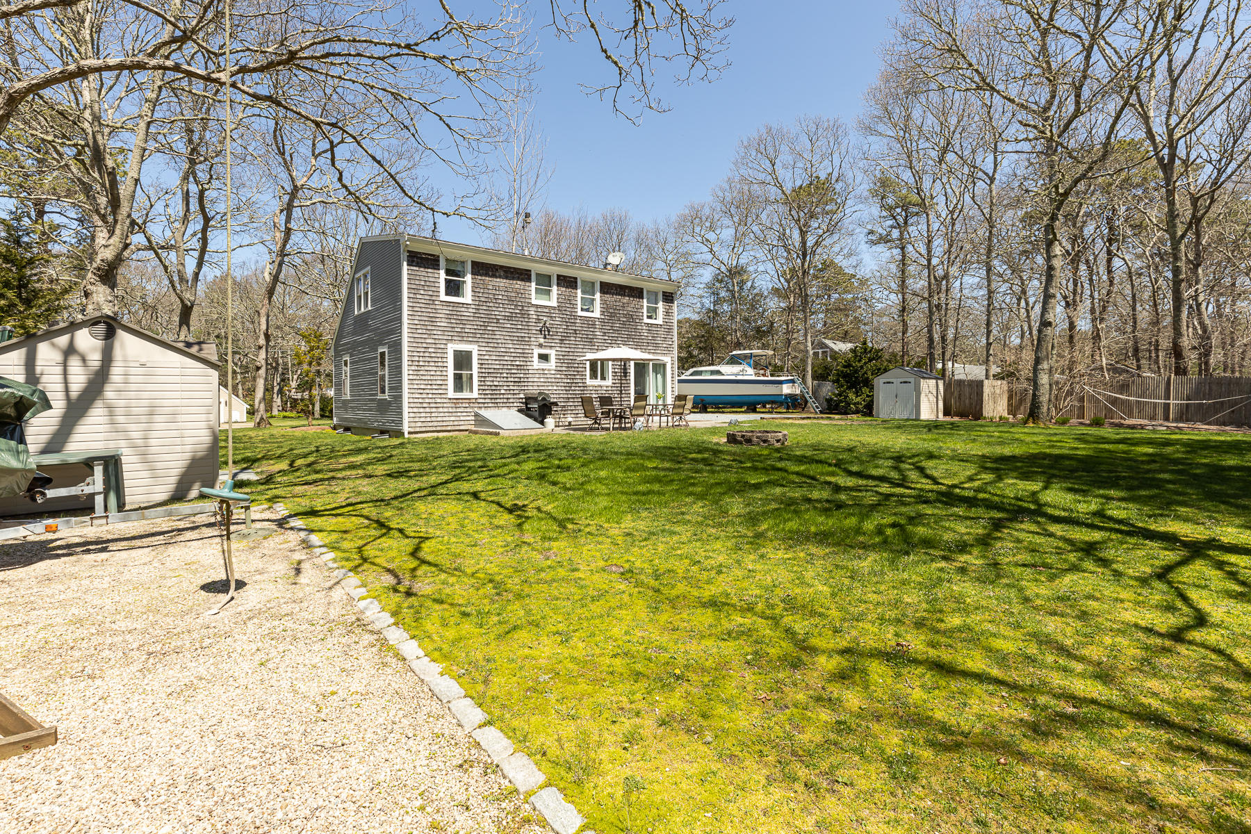 29 Hitching Post Lane Centerville, MA 02632 - Photo 27 of 29 a view of a house with a swimming pool