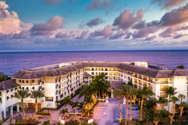 a view of a swimming pool with an outdoor seating