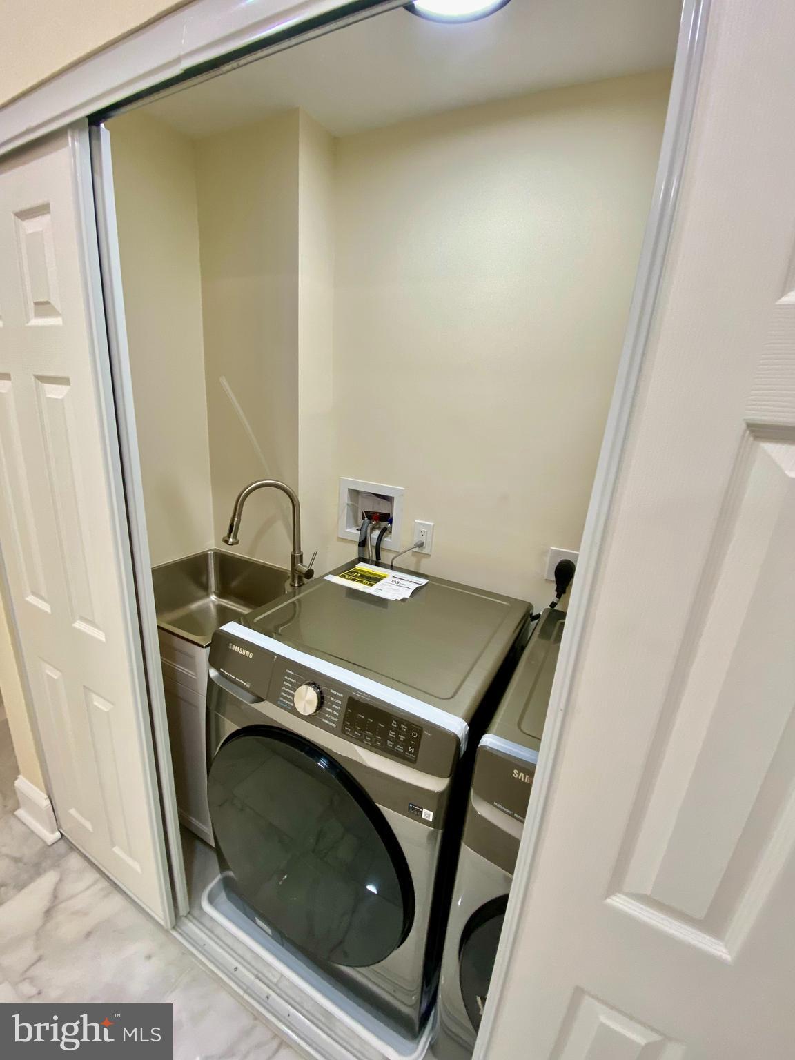2428 Eutaw Place Baltimore, MD 21217 - Photo 27 of 48 a bathroom with a sink and a mirror