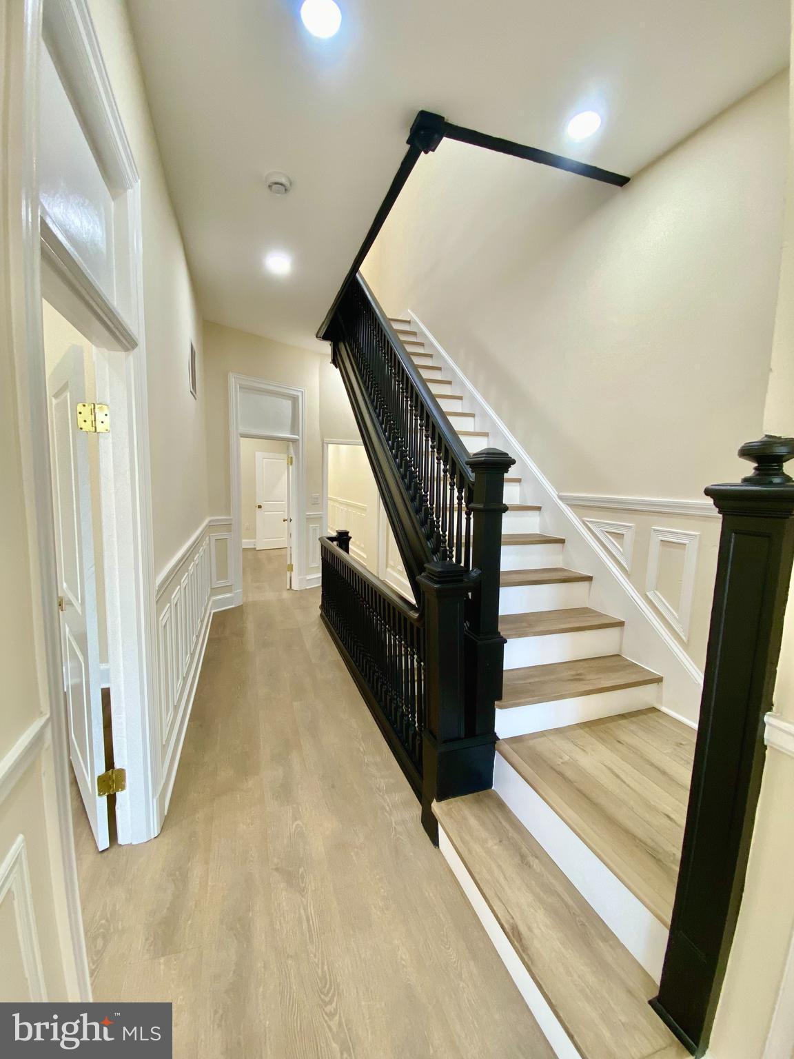 2428 Eutaw Place Baltimore, MD 21217 - Photo 28 of 48 a view of a hallway with staircase