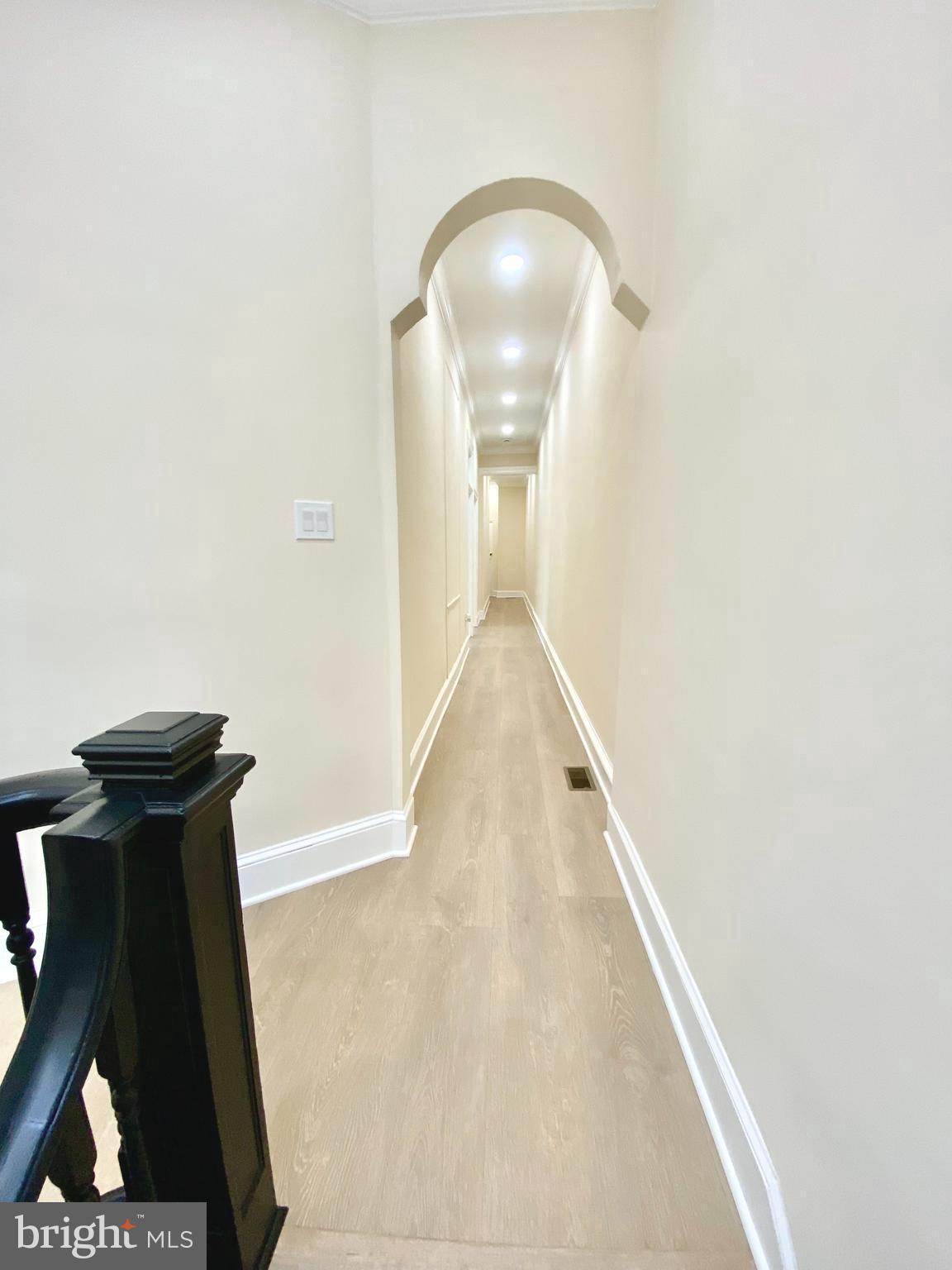 2428 Eutaw Place Baltimore, MD 21217 - Photo 30 of 48 an entryway in a room with a mirror