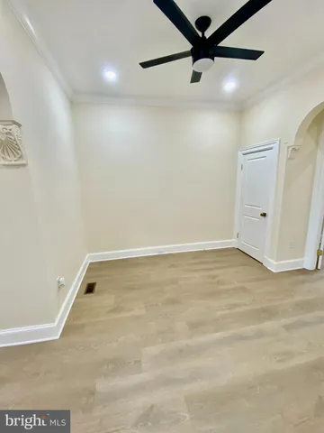 a bathroom with a tub sink and shower