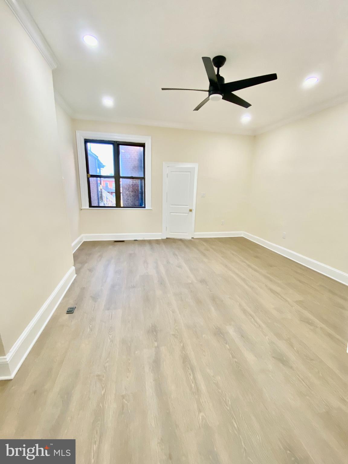 2428 Eutaw Place Baltimore, MD 21217 - Photo 36 of 48 a view of empty room with windows