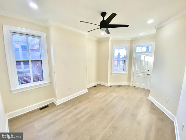 a view of a balcony with wooden floor