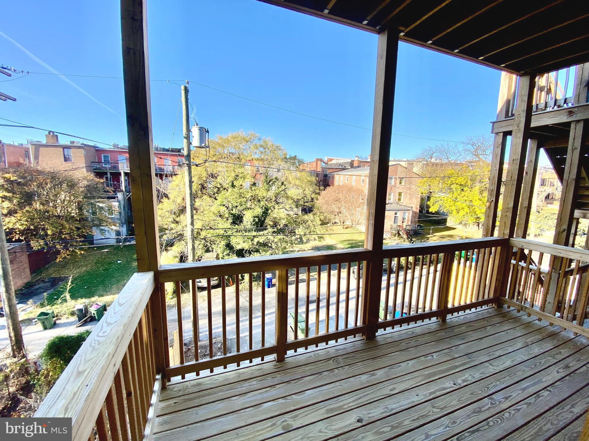 2428 Eutaw Place Baltimore, MD 21217 - Photo 43 of 48 a view of balcony with wooden floor