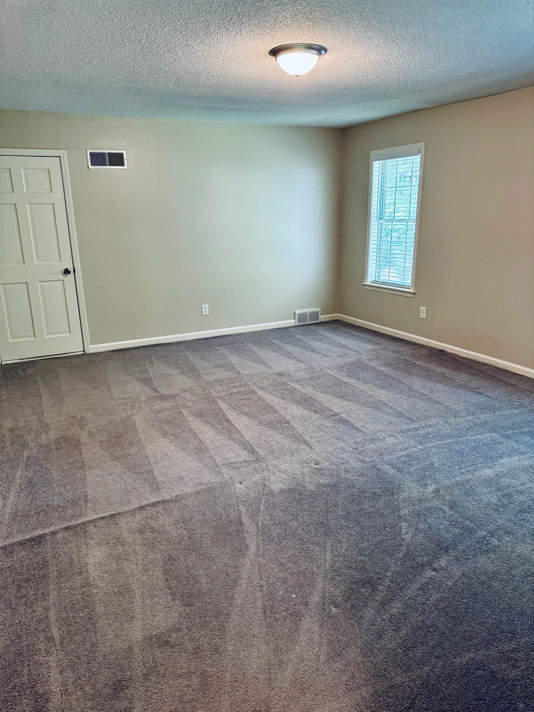 2212 Howard Road Germantown, TN 38138 - Photo 16 of 24 an empty room with windows