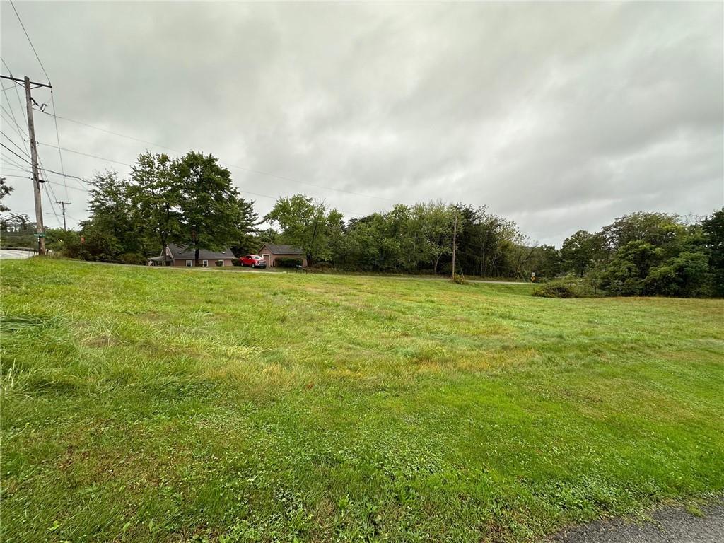 0 Temple Road Monaca, PA 15061 - Photo 13 of 14 a view of a green field with wooden fence