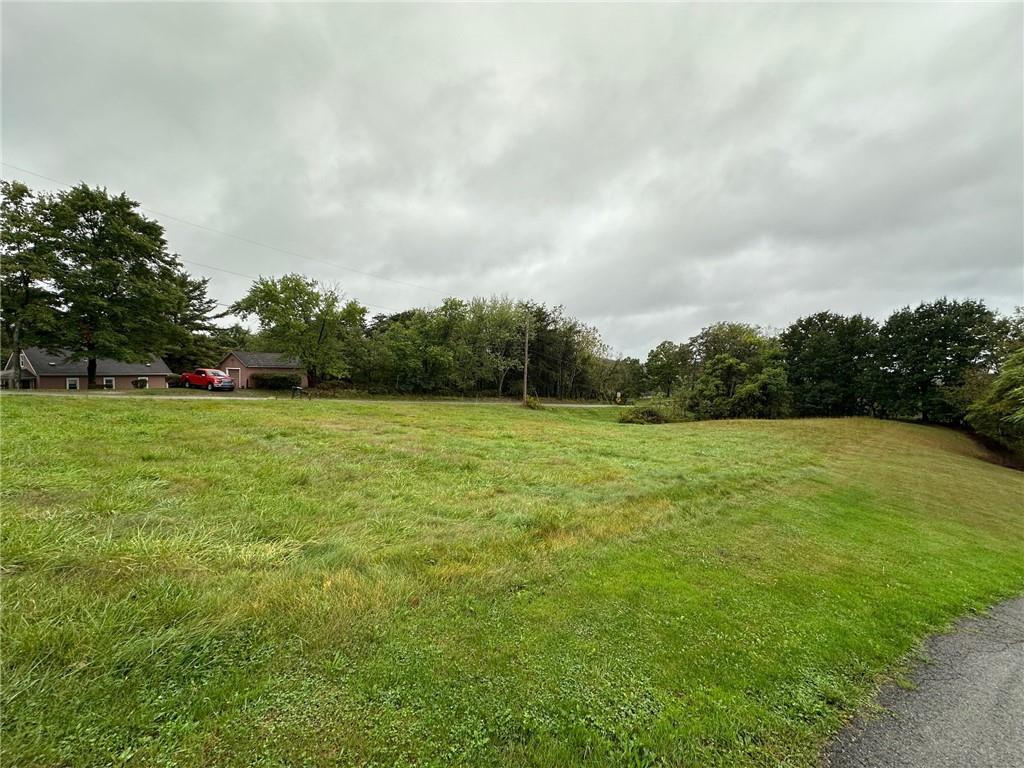 0 Temple Road Monaca, PA 15061 - Photo 14 of 14 a view of a green field with wooden fence