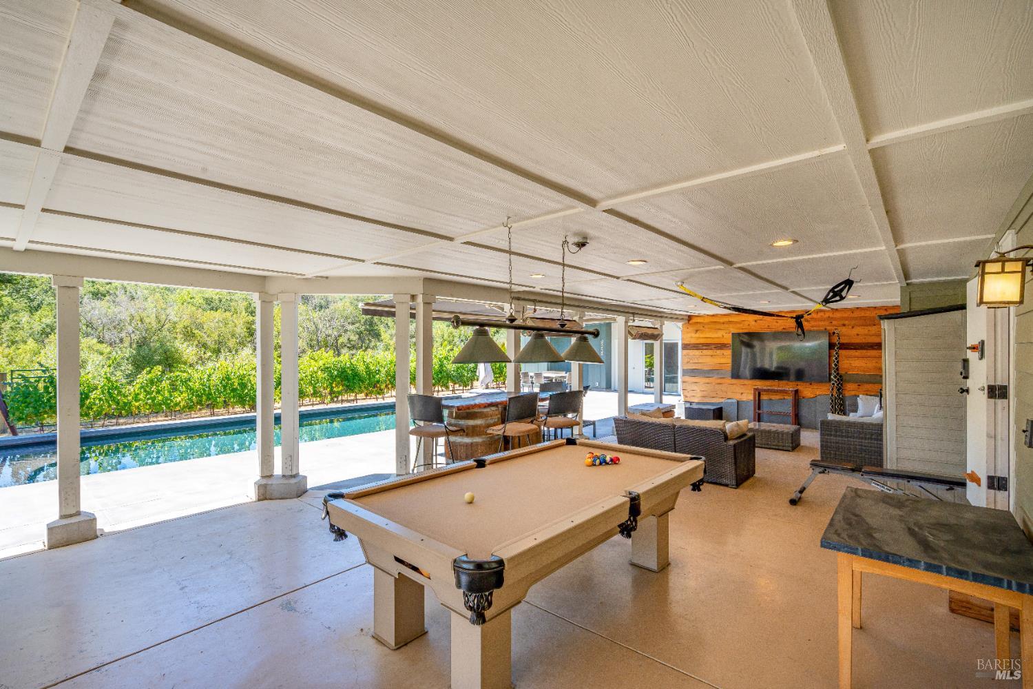 4920 Warm Springs Road Glen Ellen, CA 95442 - Photo 32 of 50 Step into the shade after a dip into the outdoor lounge with view and heaters.