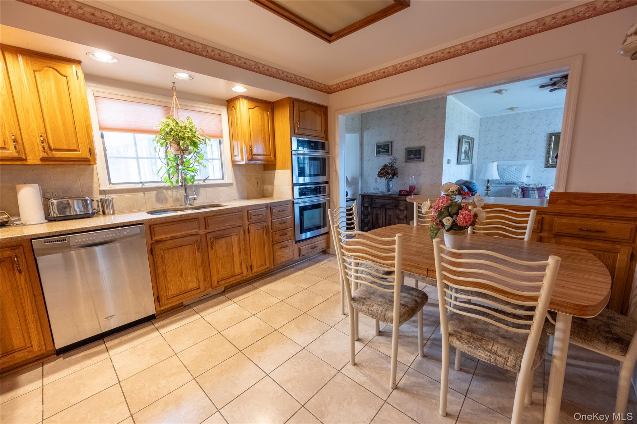 5028-5030 Rt-82 Millbrook, NY 12578 - Photo 29 of 50 a dining room with furniture a window and kitchen view