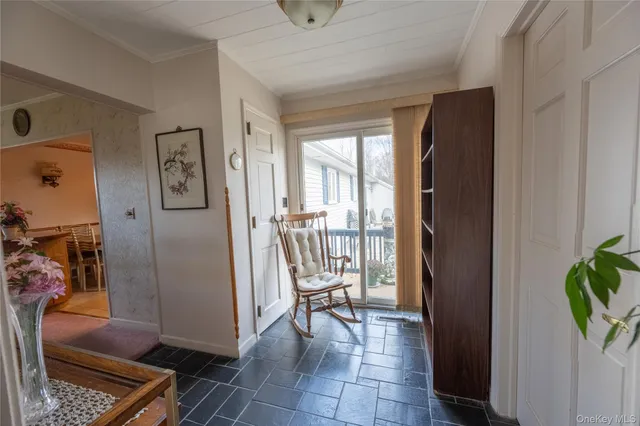 a living room with furniture and a gate