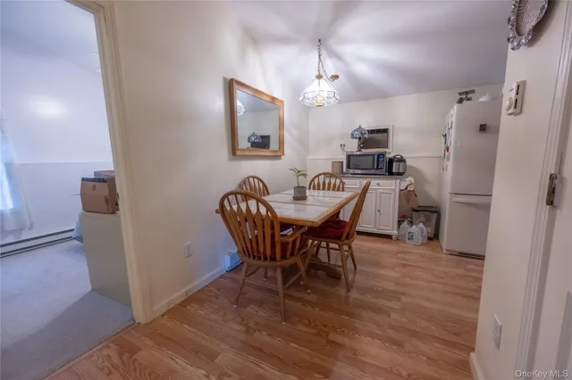 a view of a dining room with furniture