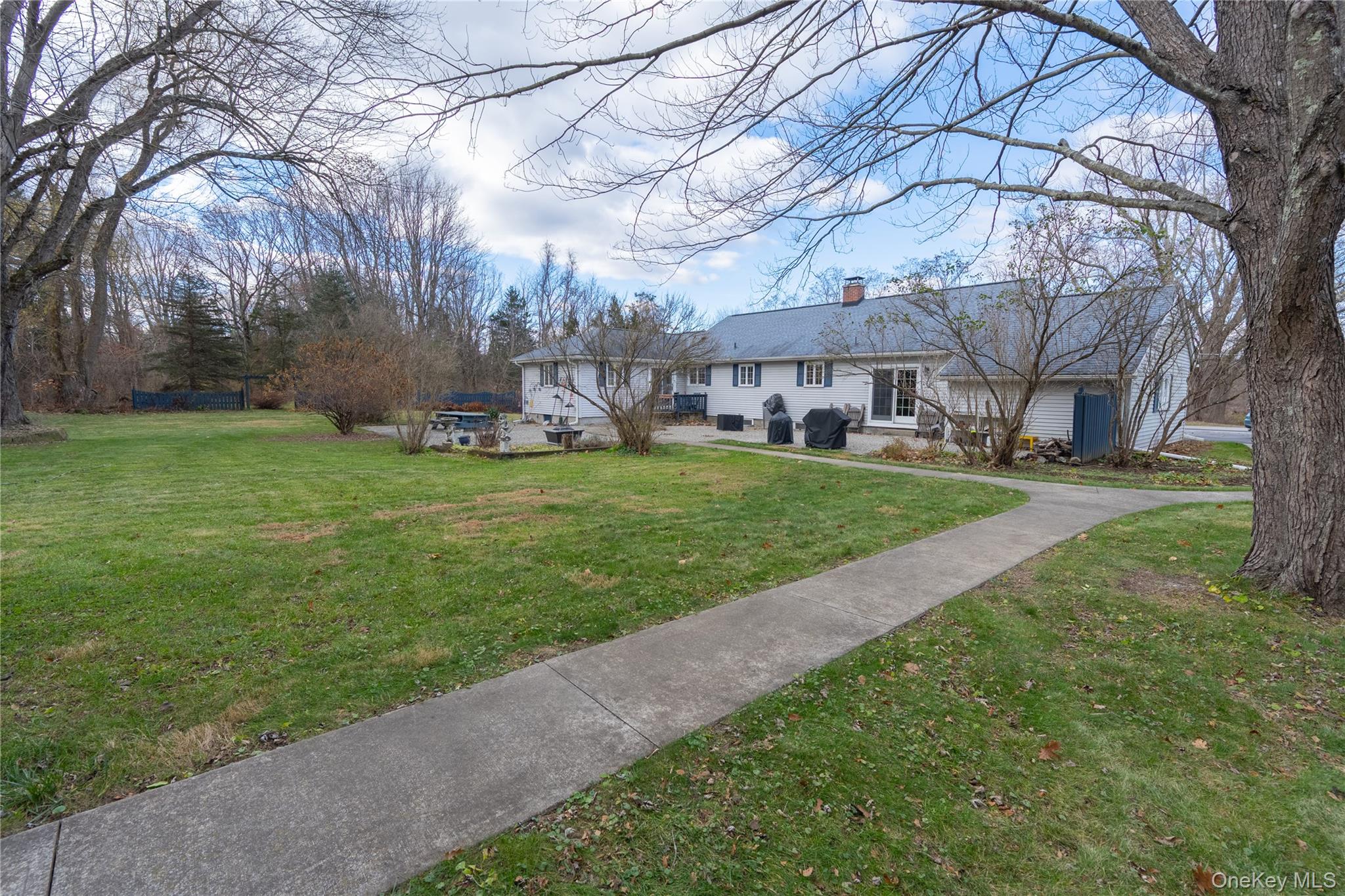 5028-5030 Rt-82 Millbrook, NY 12578 - Photo 50 of 50 a view of a yard with a house in the background