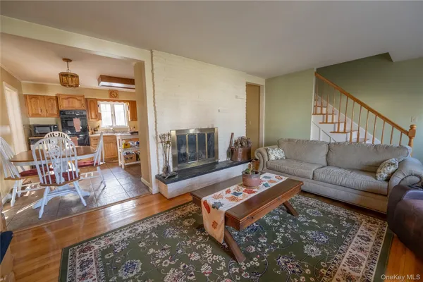 a living room with furniture and a table