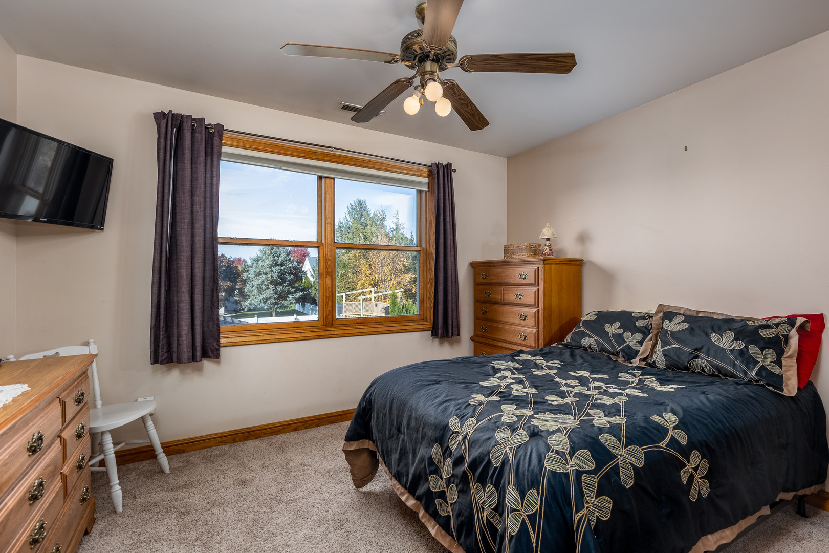 844 Kimberly Lane Ottawa, IL 61350 - Photo 13 of 36 a bedroom with a bed and a chandelier