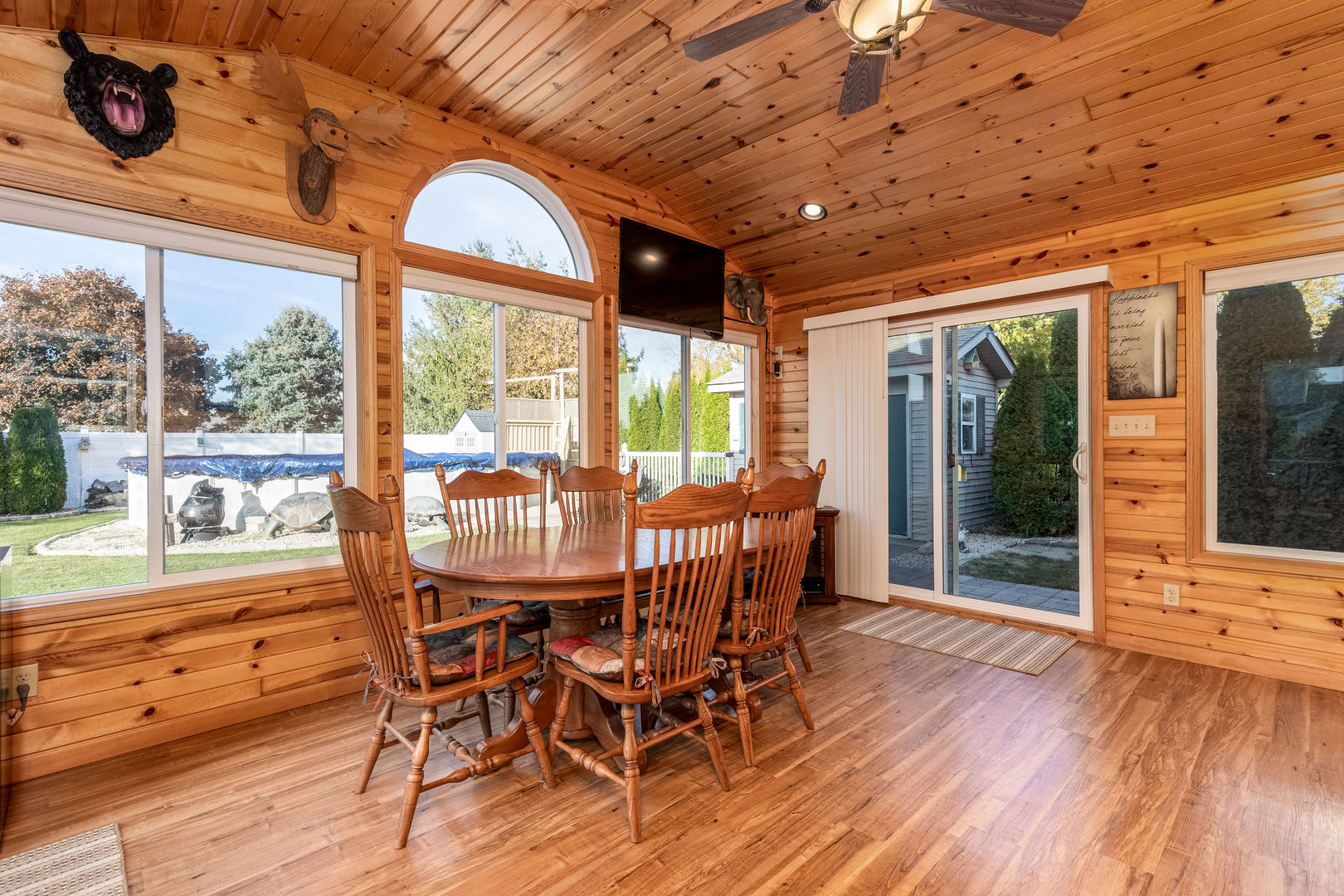 844 Kimberly Lane Ottawa, IL 61350 - Photo 9 of 36 a dining room with furniture large windows and wooden floor