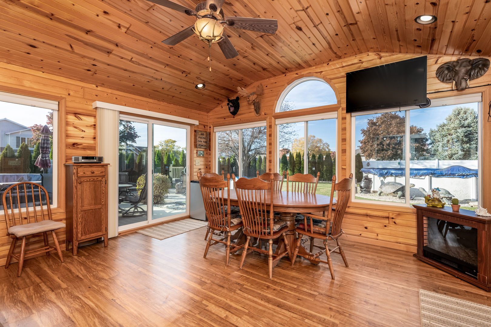 844 Kimberly Lane Ottawa, IL 61350 - Photo 10 of 36 a view of a dining room with furniture large windows and wooden floor