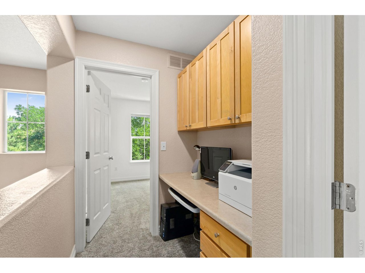 639 Americana Road Longmont, CO 80504 - Photo 23 of 50 2nd floor hallway