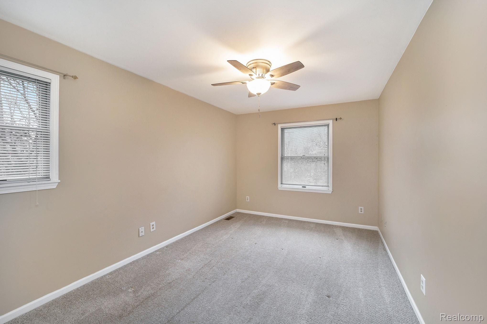 349 South Crooks Road, Unit 5 Clawson, MI 48017 - Photo 15 of 24 Master Bedroom w/ Ceiling Fan