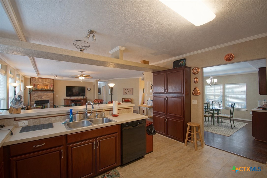 73 Rose Way North Victoria, TX 77905 - Photo 14 of 44 a large kitchen with a large counter top appliances and cabinets
