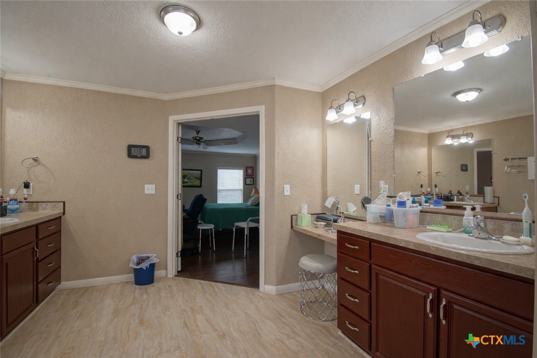 73 Rose Way North Victoria, TX 77905 - Photo 22 of 44 a kitchen with sink and view of living room