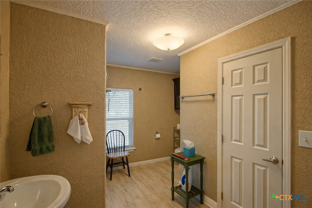 73 Rose Way North Victoria, TX 77905 - Photo 23 of 44 a bathroom with a sink and a mirror