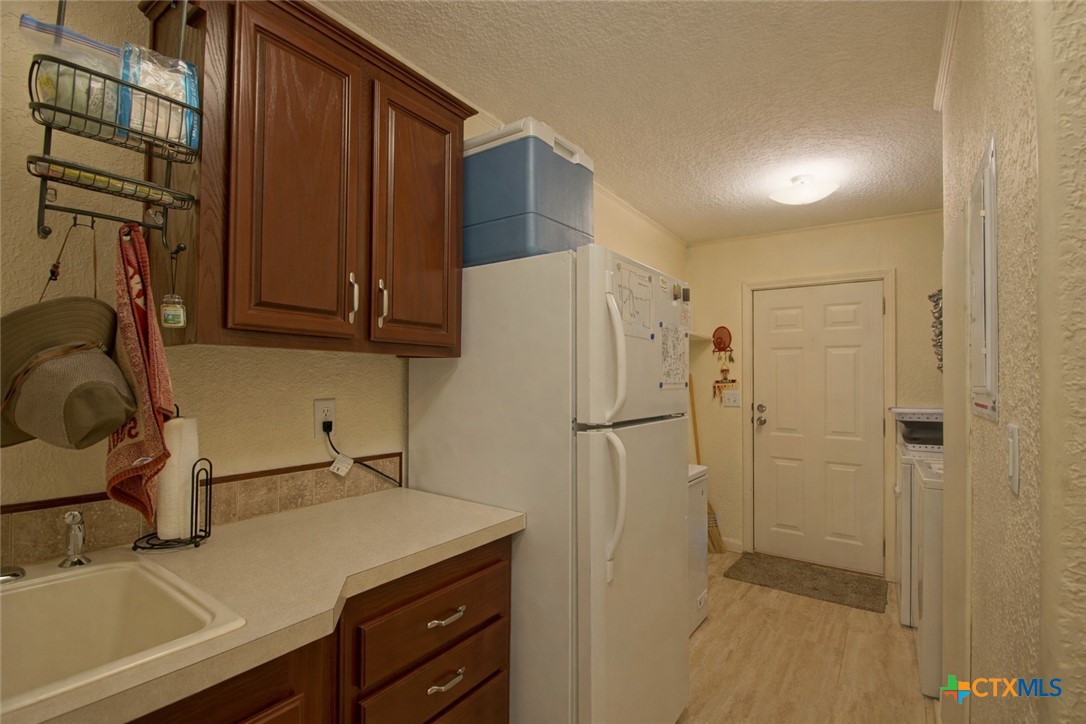 73 Rose Way North Victoria, TX 77905 - Photo 35 of 44 a utility room with dryer and washer