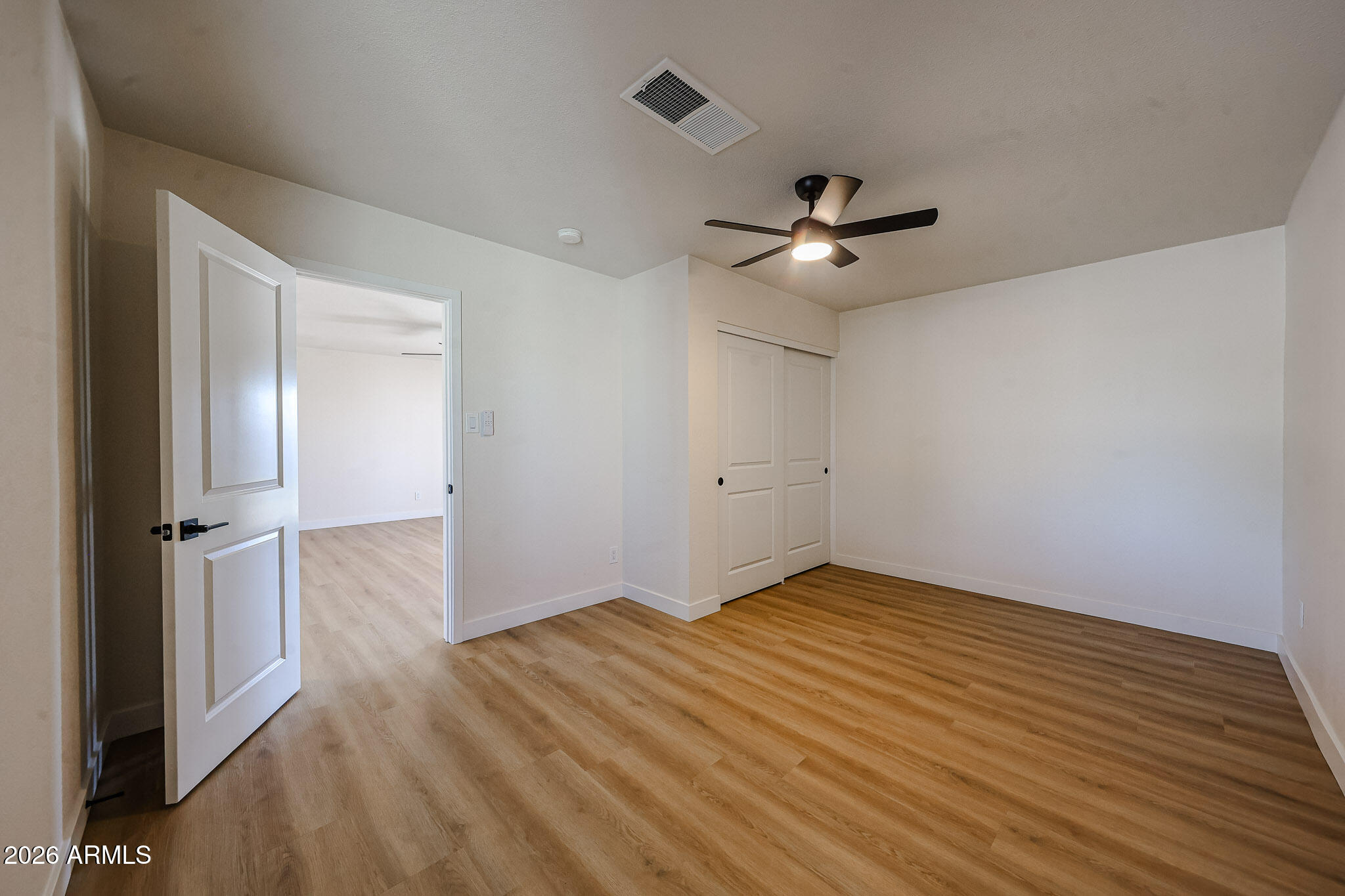 3337 West Ocotillo Road Phoenix, AZ 85017 - Photo 11 of 30 wooden floor in an empty room