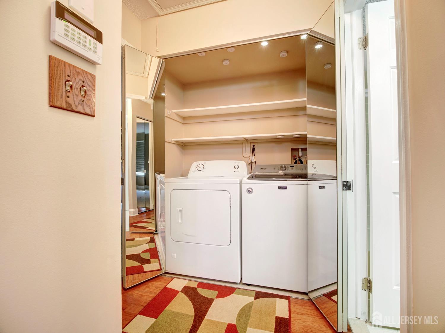 136 Wycoff Way West East Brunswick, NJ 08816 - Photo 20 of 28 a utility room with dryer and washer