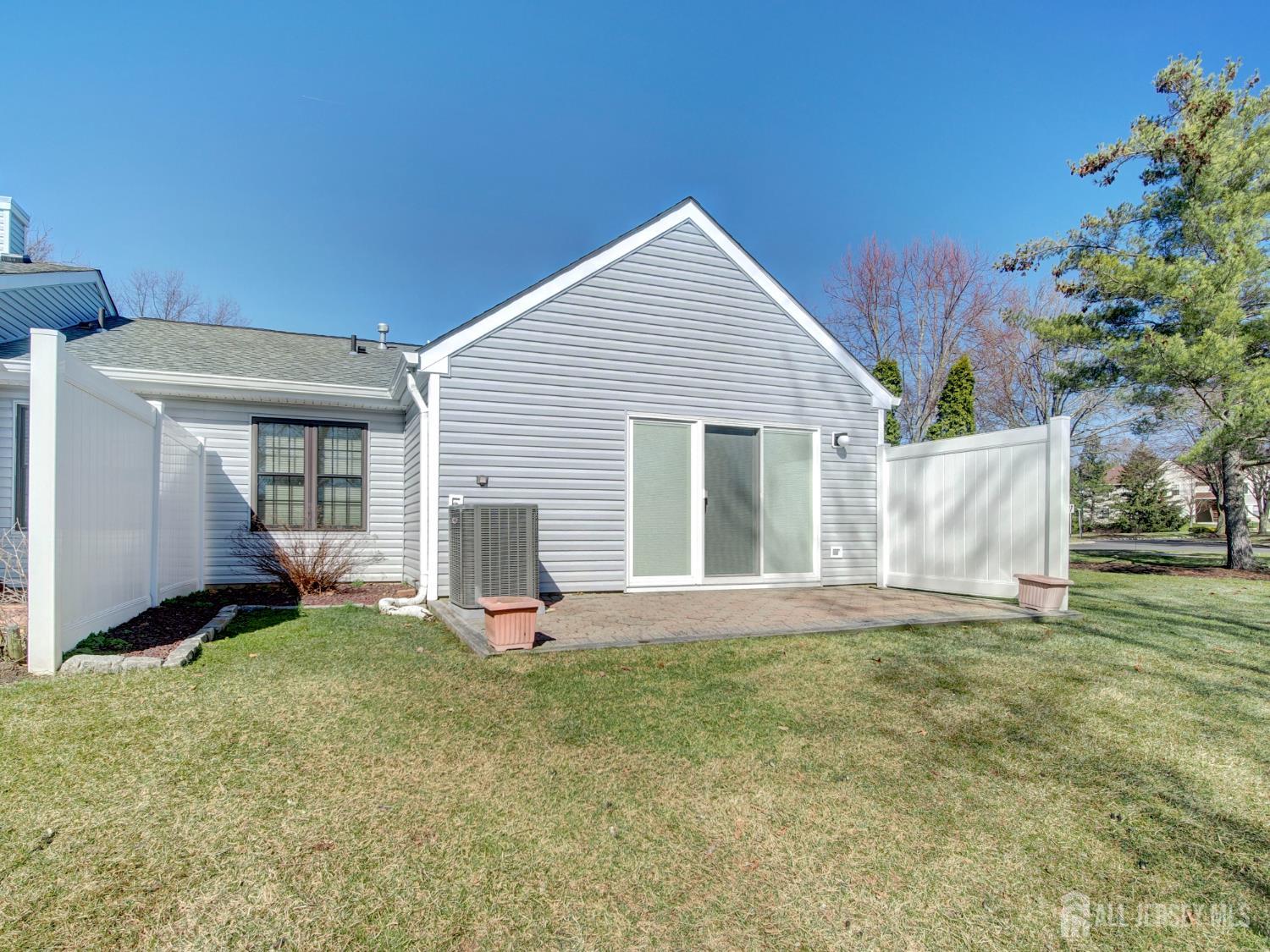 136 Wycoff Way West East Brunswick, NJ 08816 - Photo 24 of 28 a view of a house with a yard and porch