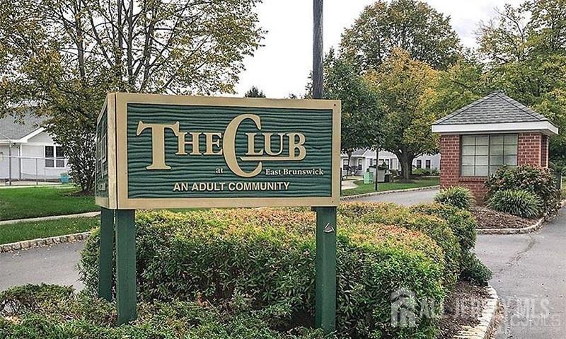 136 Wycoff Way West East Brunswick, NJ 08816 - Photo 25 of 28 a sign broad on the side of the house