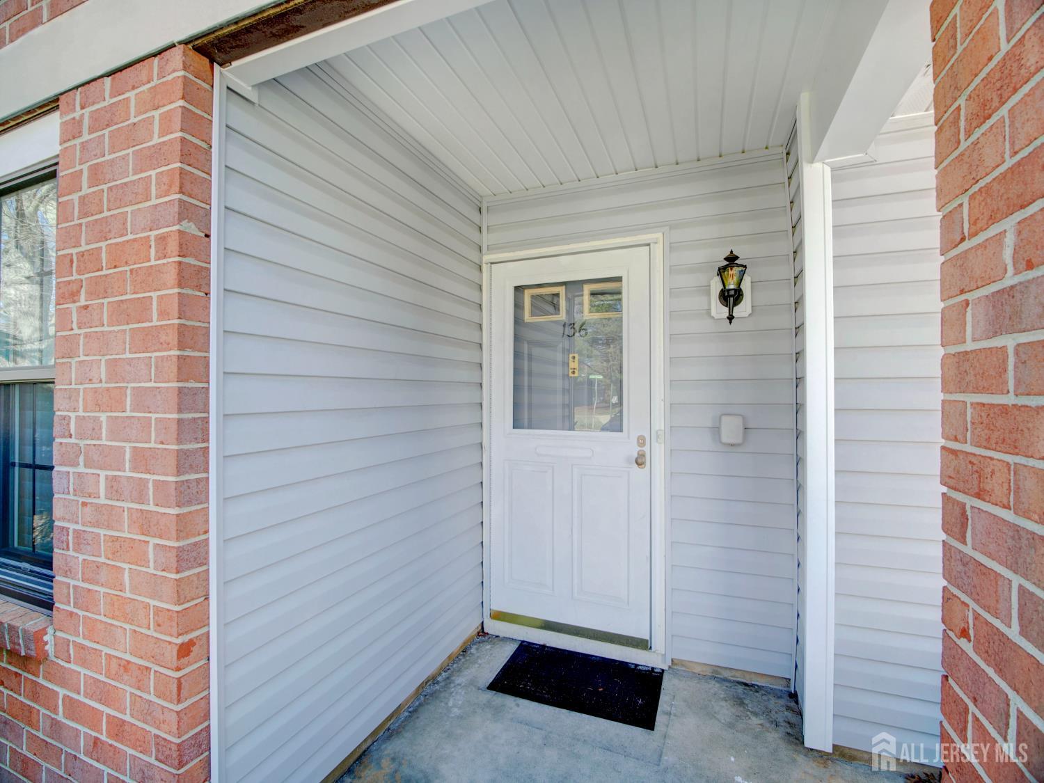 136 Wycoff Way West East Brunswick, NJ 08816 - Photo 3 of 28 a view of front door of house