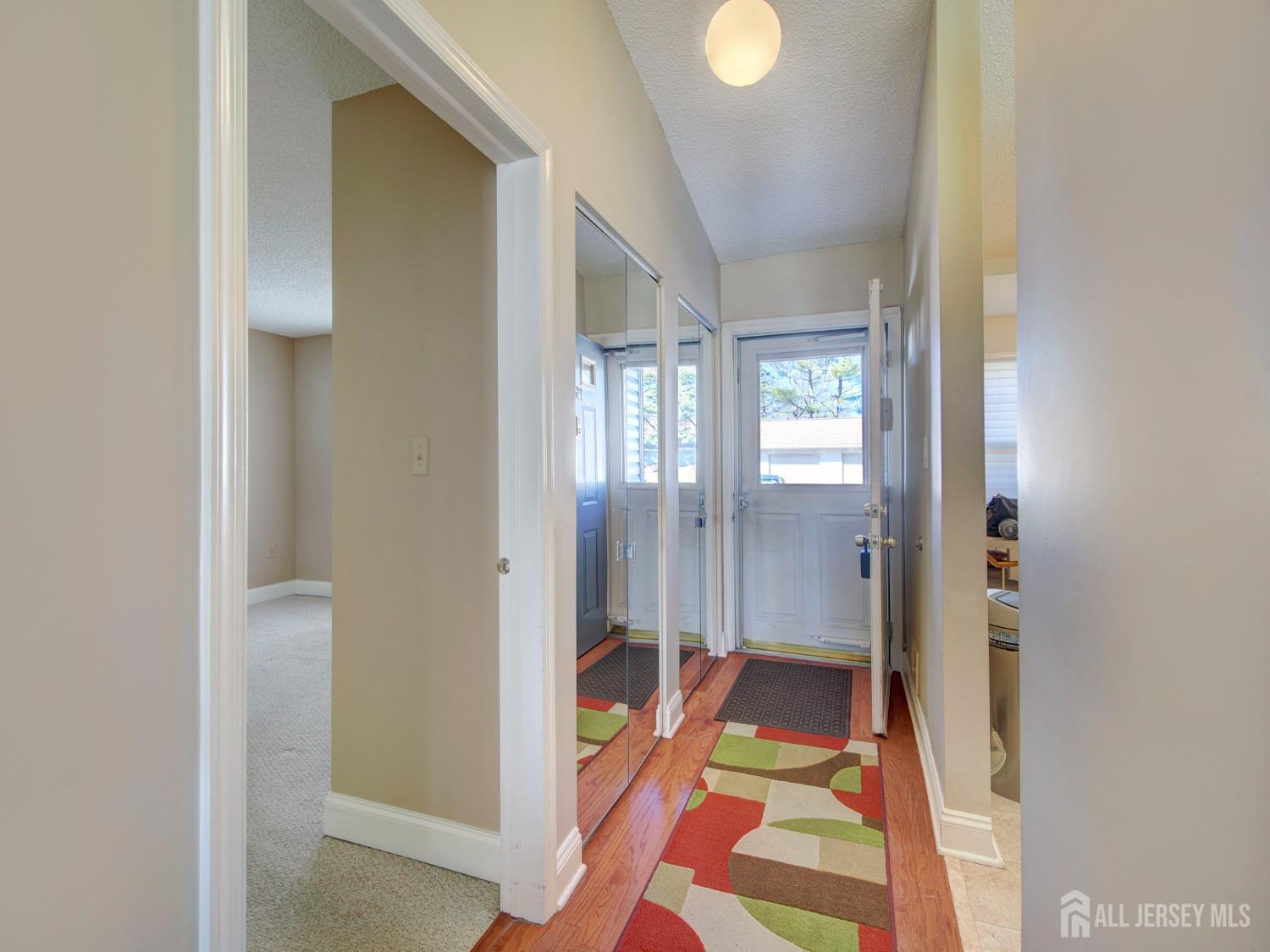 136 Wycoff Way West East Brunswick, NJ 08816 - Photo 4 of 28 a bathroom with a bathtub and shower