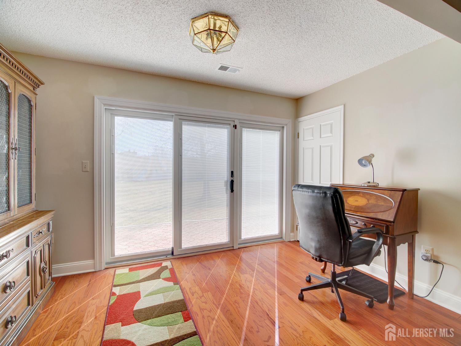 136 Wycoff Way West East Brunswick, NJ 08816 - Photo 10 of 28 a workspace with furniture and window