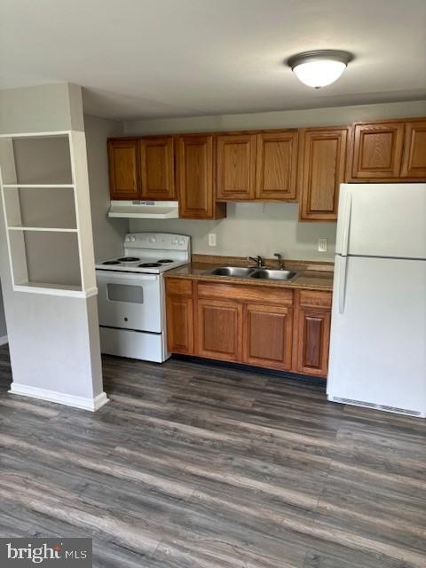 27 East Main Street, Unit F Windsor, PA 17366 - Photo 3 of 6 a kitchen with granite countertop stainless steel appliances and wooden cabinets
