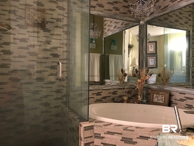 27284 Gulf Road, Unit 305 Orange Beach, AL 36561 - Photo 19 of 25 Master Bath - Shower & Tu