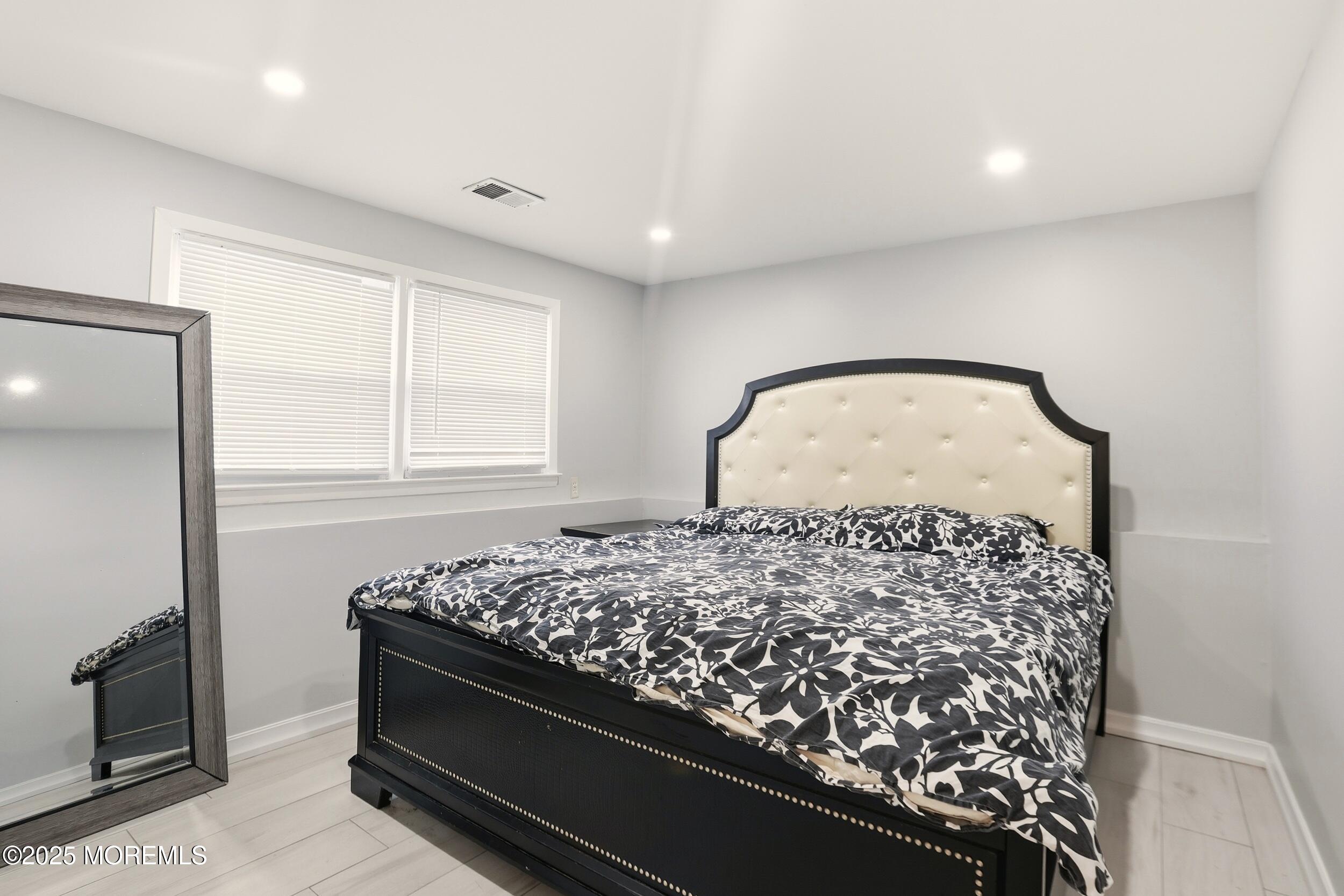 7 Citadel Court Jackson, NJ 08527 - Photo 19 of 29 a bedroom with bed and a window