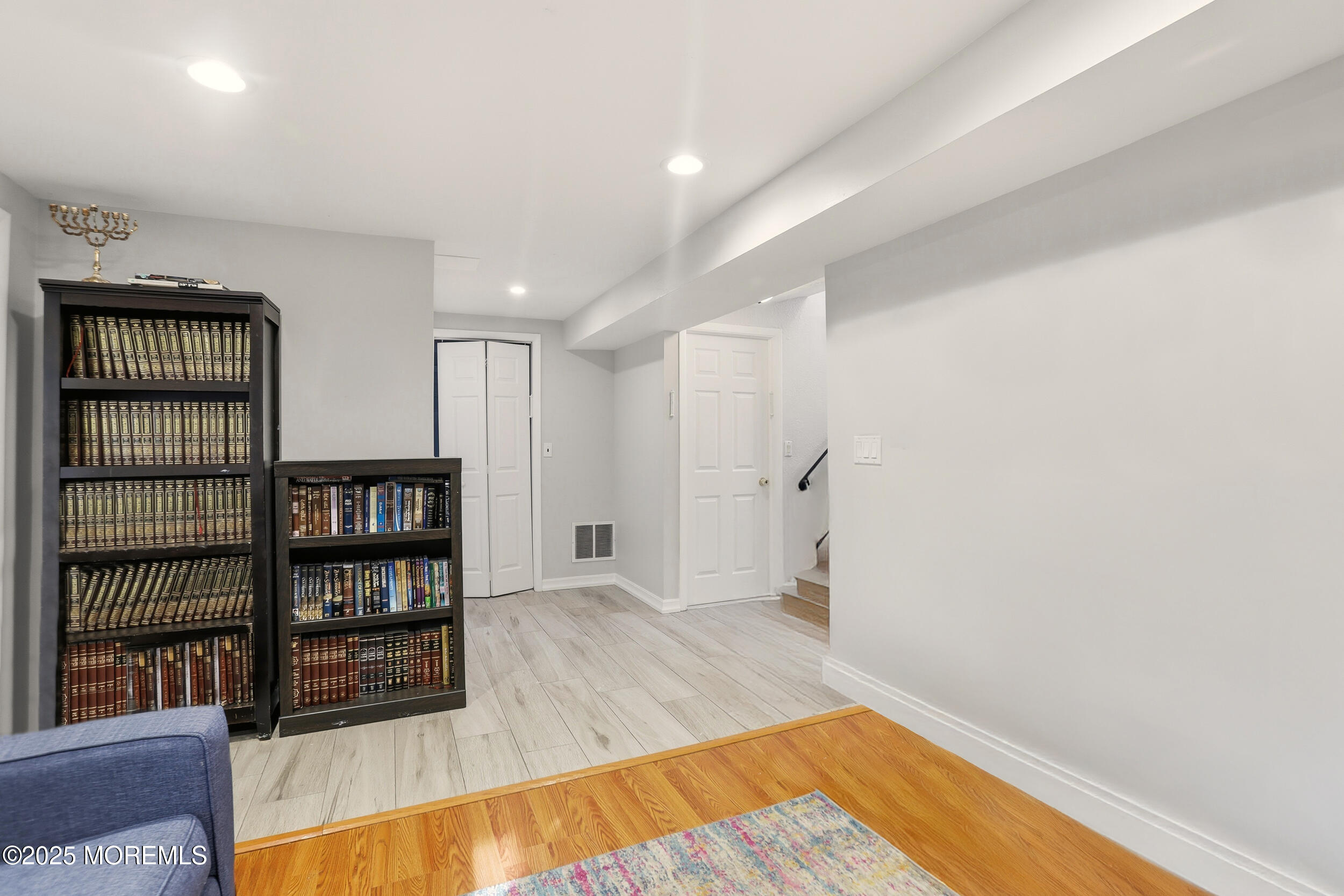 7 Citadel Court Jackson, NJ 08527 - Photo 21 of 29 a view of empty room with cabinet and rug