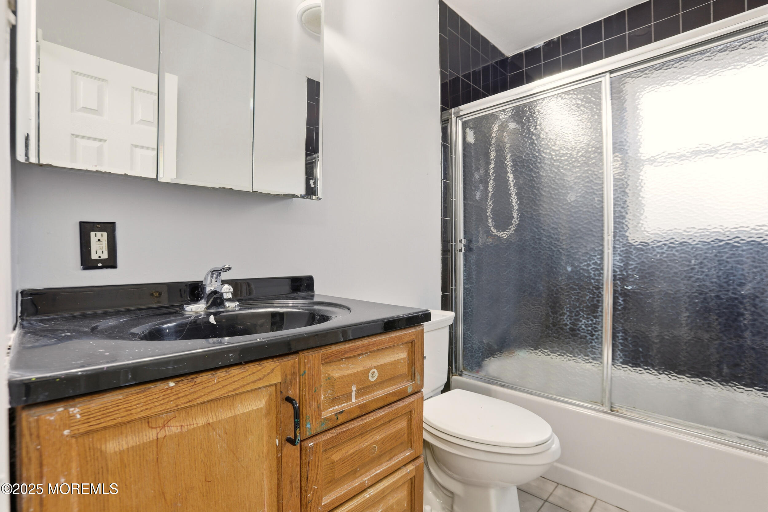 7 Citadel Court Jackson, NJ 08527 - Photo 25 of 29 a bathroom with a granite countertop sink a toilet and shower