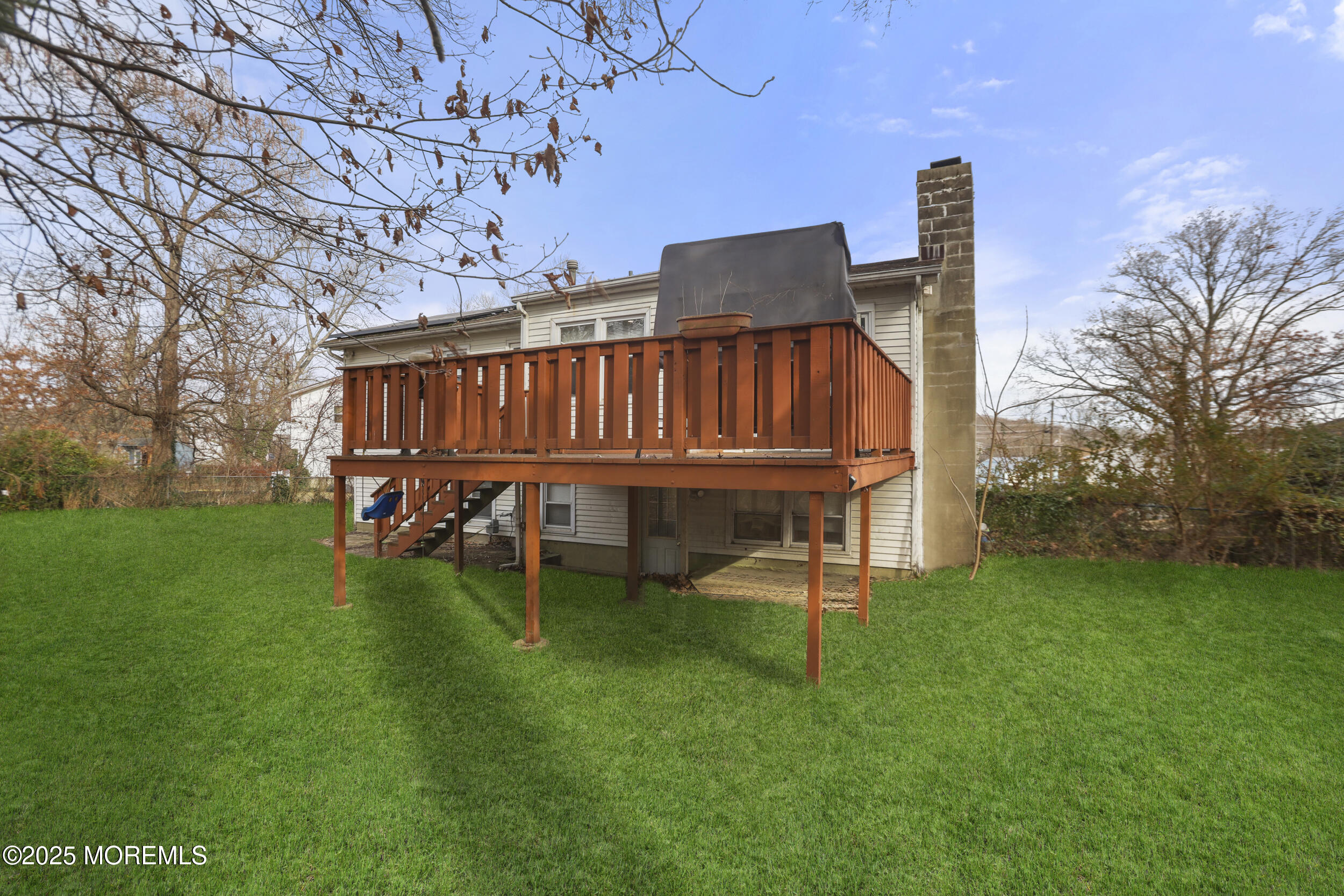 7 Citadel Court Jackson, NJ 08527 - Photo 28 of 29 a view of a chairs in a backyard of a house