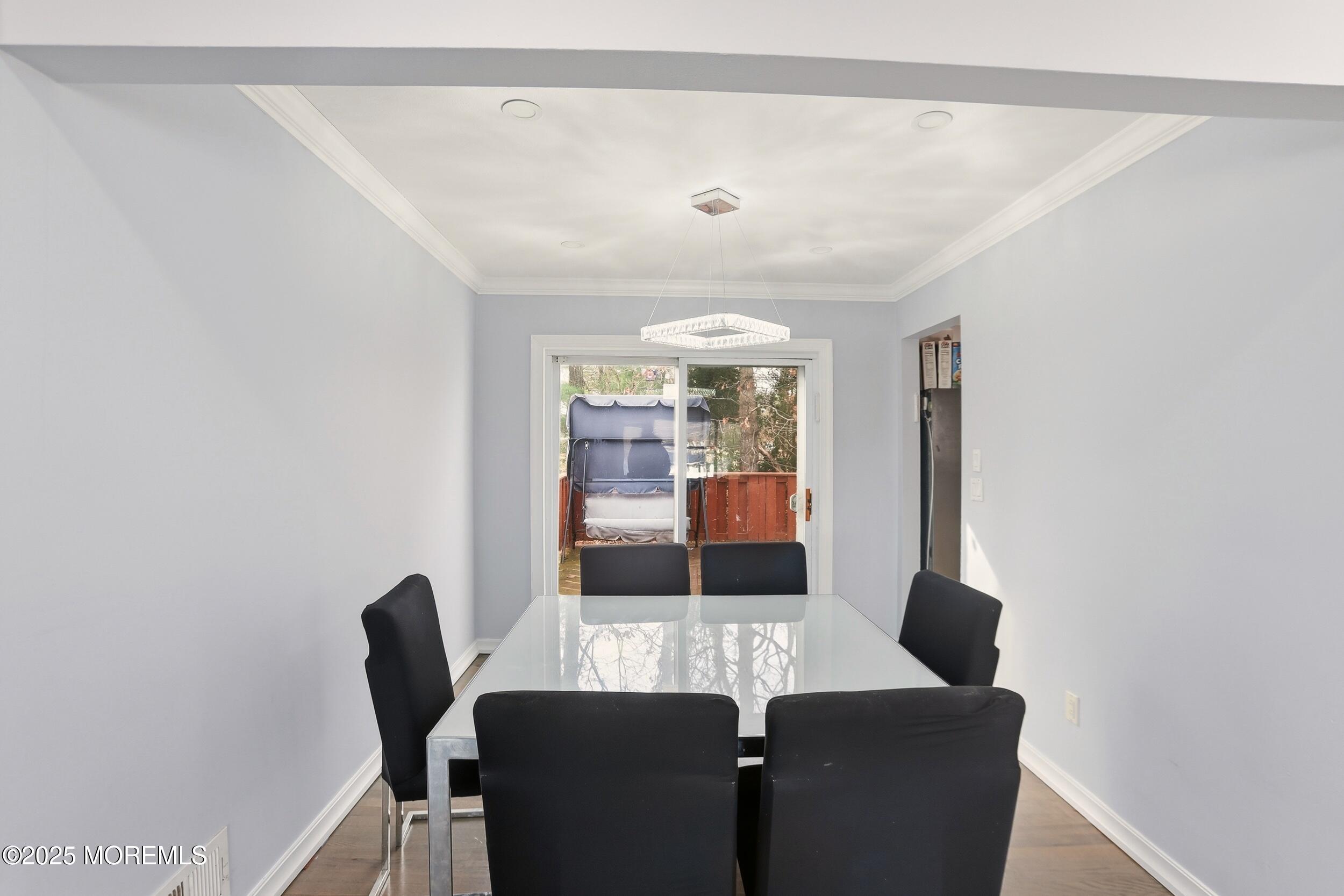 7 Citadel Court Jackson, NJ 08527 - Photo 6 of 29 a view of a dining room with furniture and wooden floor