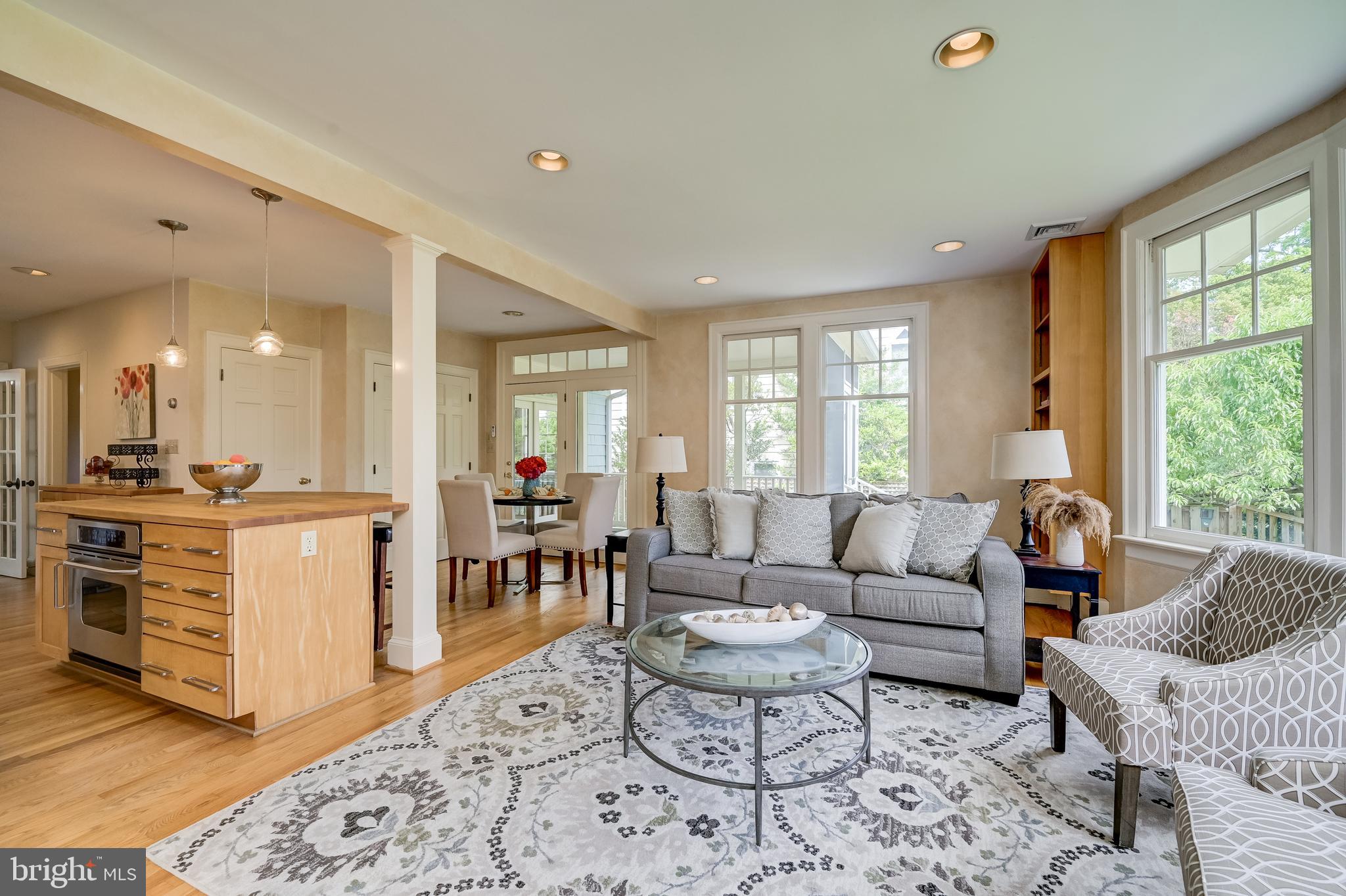 3608 Spring Street Chevy Chase, MD 20815 - Photo 17 of 38 a living room with furniture wooden floor and a large window