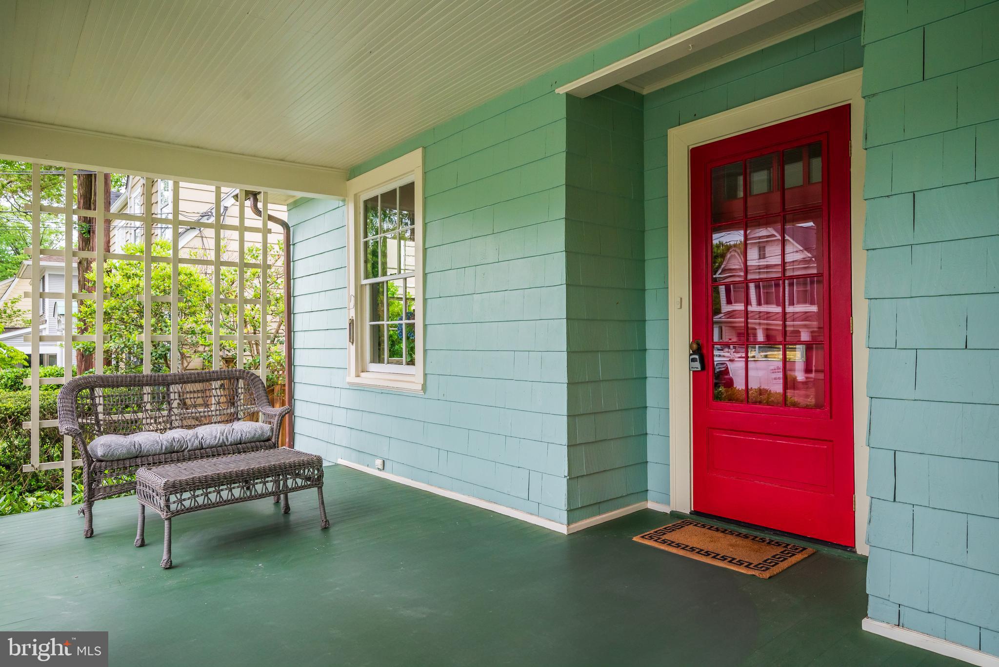 3608 Spring Street Chevy Chase, MD 20815 - Photo 2 of 38 a backyard of a house with outdoor seating
