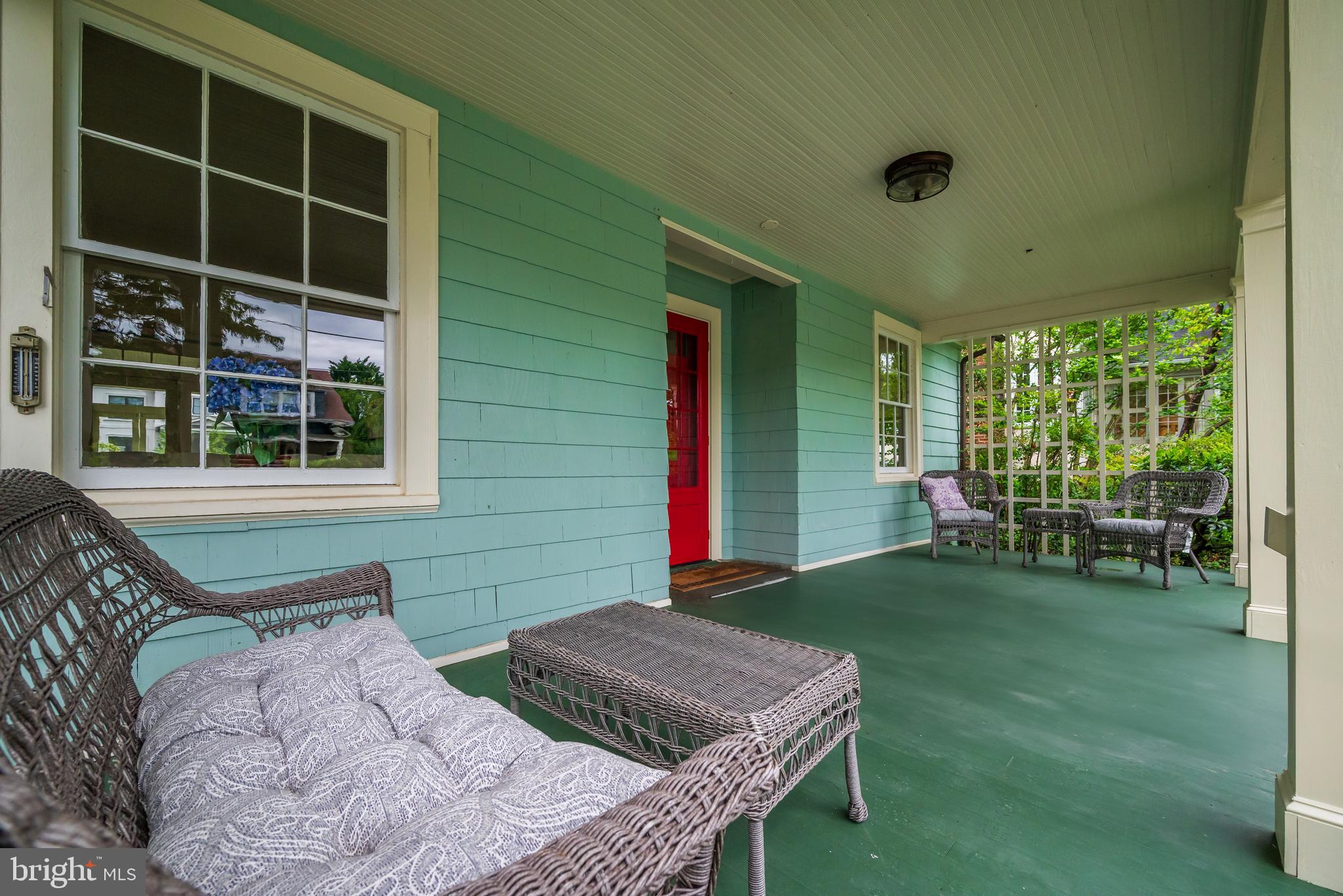 3608 Spring Street Chevy Chase, MD 20815 - Photo 3 of 38 a backyard of a house with seating space