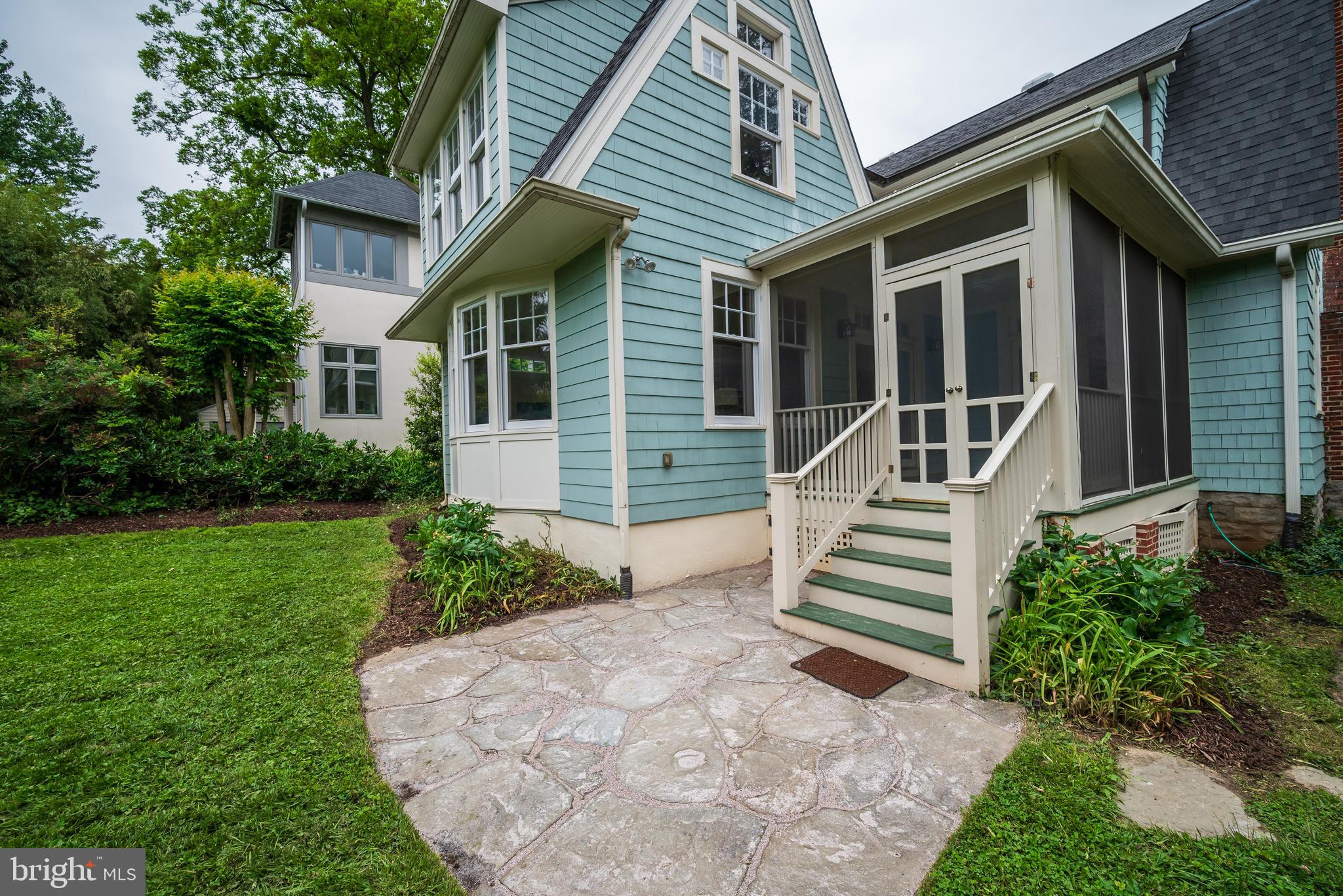 3608 Spring Street Chevy Chase, MD 20815 - Photo 32 of 38 a front view of a house with a yard