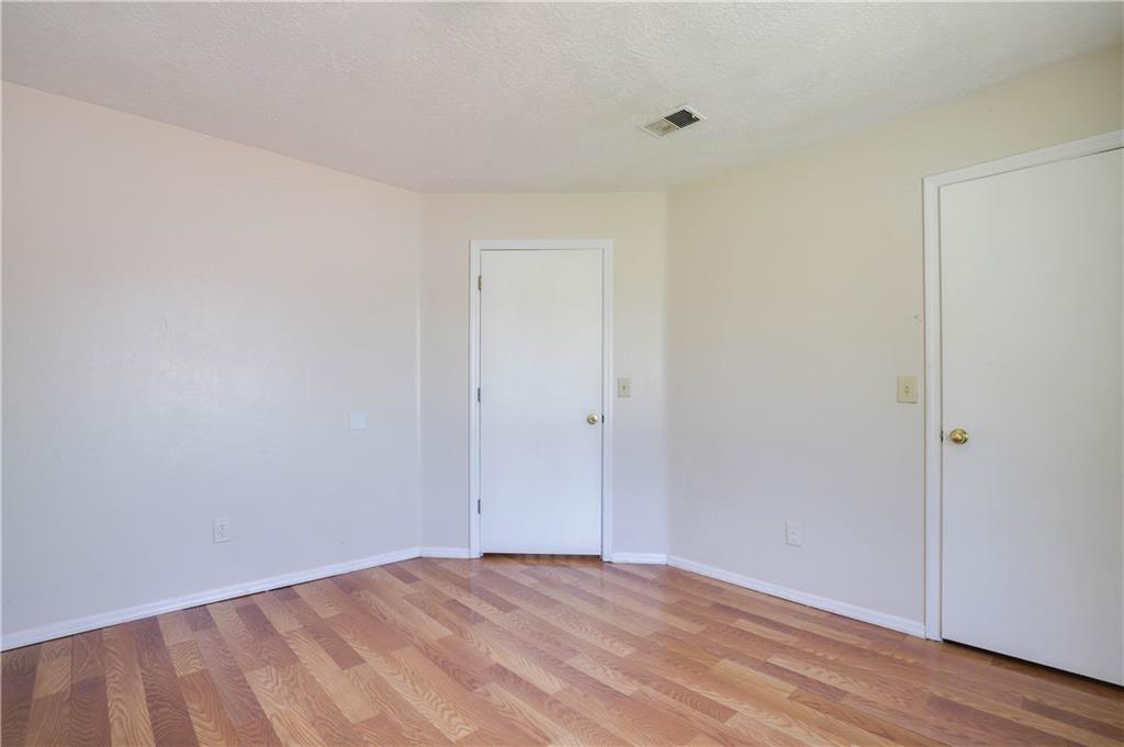 7043 Ivy Pointe Row Austell, GA 30168 - Photo 19 of 36 a view of an empty room