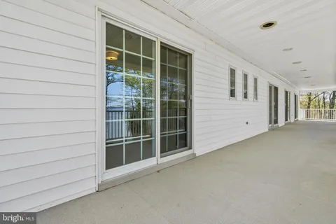 front view of a building with a yard